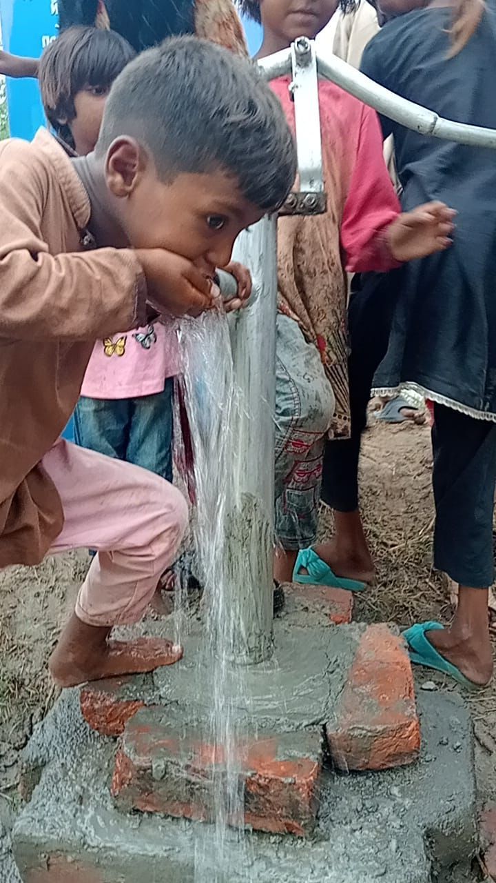 Child drinking clean water for the first time
